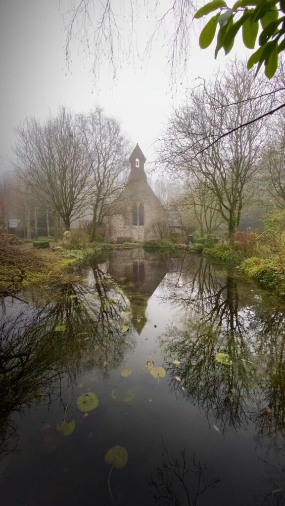 Reflections of a church in the garden of a holiday cottage near Pewsey, Avebury and Marlborough in Wiltshire